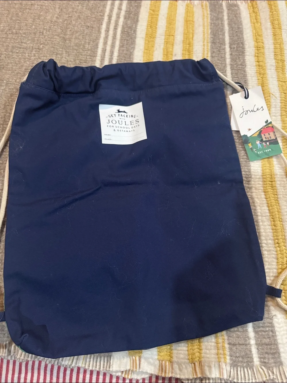 Joules Navy Drawstring Backpack with Rainbow Rays and Horse Motif